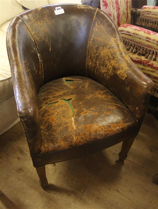 Brown leather tub chair